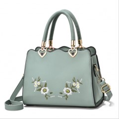 Sac à main et bandoulière brodé en cuir PU