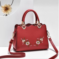 Sac à main et bandoulière brodé en cuir PU