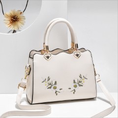Sac à main et bandoulière brodé en cuir PU