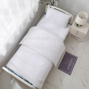 Draps ,housse de couette et taie d'oreiller pour lit médical
