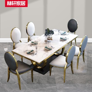 Ensemble table et chaises de salle à manger en marbre avec structure en acier inoxydable