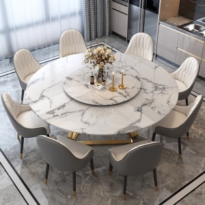 Chaises et table ronde à manger en marbre