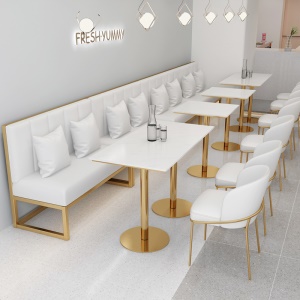 Table à manger en marbre et fauteuil avec support en fer forgé