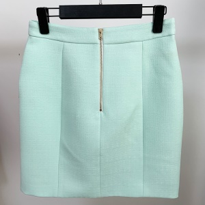 Jupe courte pour femme à double boutonnage en fibre de polyester avec boucle en métal