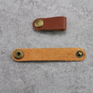 Organisateur des cordons en cuir pour câble de données/câble d'écouteur