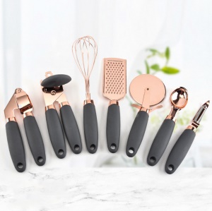 Ensemble de 7 pièces de gadgets de cuisine multifonctions (ouvre-boîte/presse à l'ail/couteau à pizza/cuillère/éplucheur/batteur à oeufs/râpe)