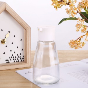 Réservoir d'assaisonnement en verre avec les trous et anneau d'étanchéité en silicone