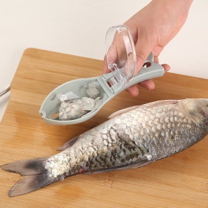 Raboteuse manuelle avec  pour enlever les écailles de poisson