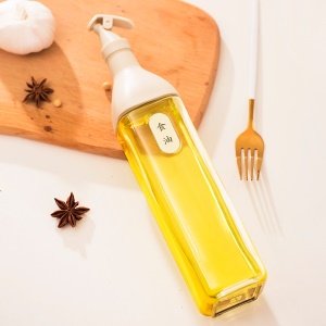 Bouteille à huile en verre avec joint d'étiquette en silicone