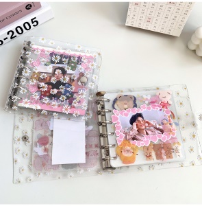 Livre à feuillets mobiles à boucle métallique et couverture transparent