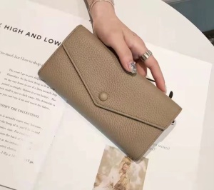Portefeuille femme avec fermeture éclair en cuir de vachette à trois plis