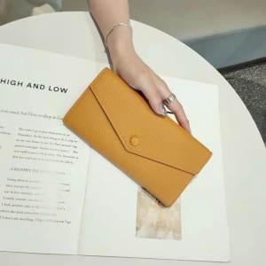 Portefeuille femme avec fermeture éclair en cuir de vachette à trois plis
