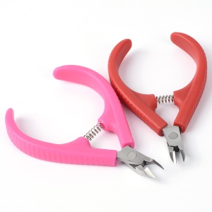 Coupe-ongles avec pinces à ressort