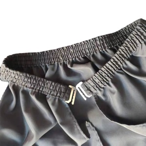 Tablier de coiffure imperméable et anti-adhésif