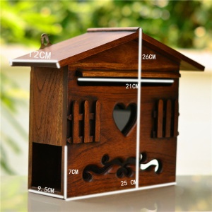 Boîte aux lettres en bois massif sculpté