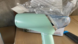 Petit fer à vapeur pliable