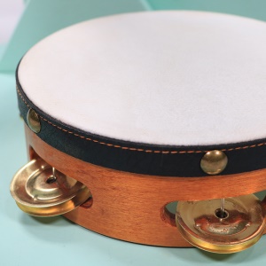 DICHI  Tambourin à 6 cloches  en cuir de vache avec une cloche dorée