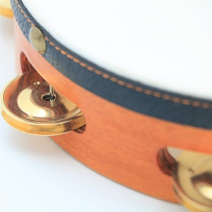 DICHI  Tambourin à 6 cloches  en cuir de vache avec une cloche dorée