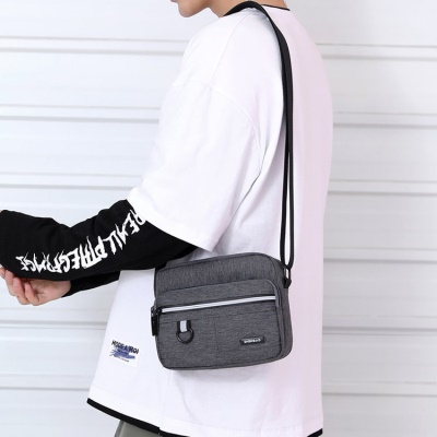 Sac à bandoulière pour homme tissu nylon bande réfléchissante résistant à l'usure