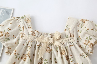 Combinaison bébé en coton et à motif fleuri
