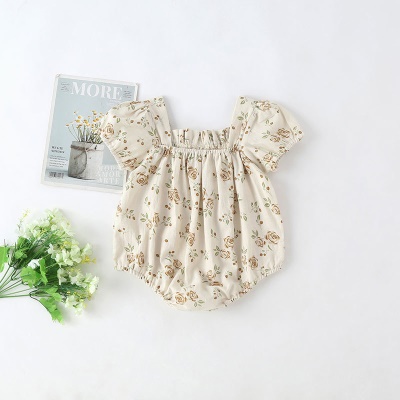 Combinaison bébé en coton et à motif fleuri