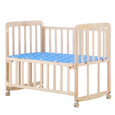 Lit de bébé en bois massif transformable en  table de bureau