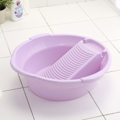Lave-linge en plastique avec planche à laver
