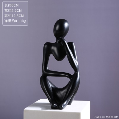 Objet d'art  en résine personnage pensif