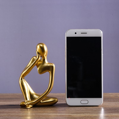 Objet d'art  en résine personnage pensif