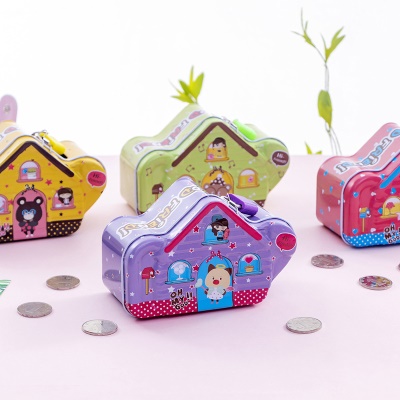 Petite tirelire  en métal en forme  de maison