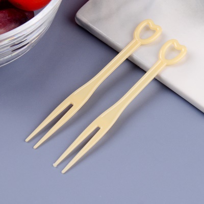 Fourchette jetable en plastique transparent en forme de cœur