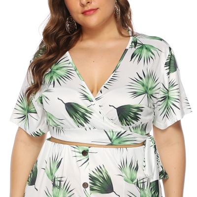 robe feuille imprimé bandoulière boutons nu ombilical