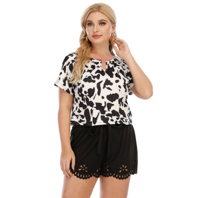 Tops pour femmes en noir et blanc avec imprimé animal