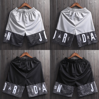 Shorts de sport pantalon mi-long sur le genou