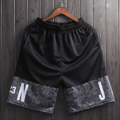 Shorts de sport pantalon mi-long sur le genou