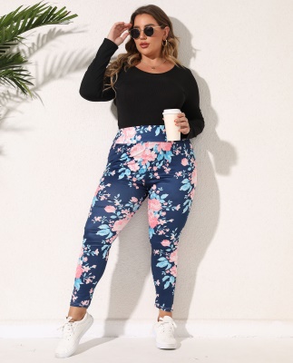 Pantalon femme fleur imprimé moulant en soie