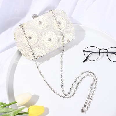 Sac de banquet à paillettes à la main