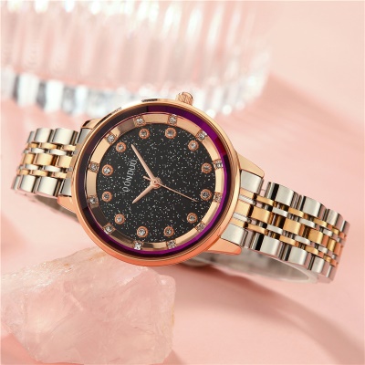Montre pour femmes boucle en acier inoxydable sertie de diamants en alliage de zinc