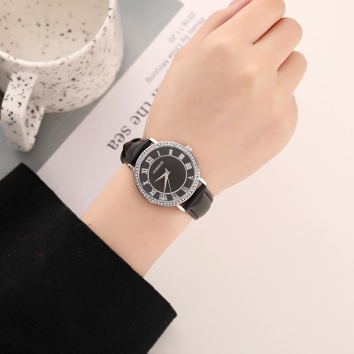 montre chiffres romains ceinture avec diamants