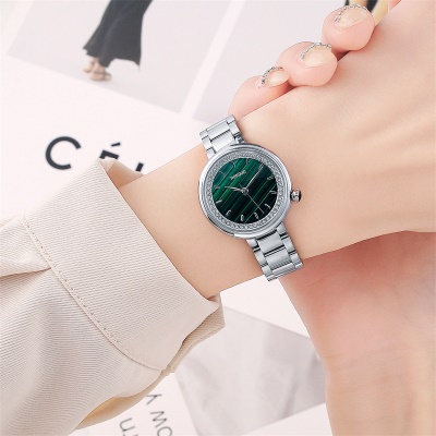 montre cadran vert papillon double bouton étanche