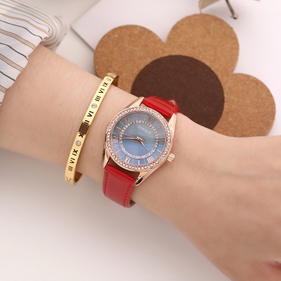Montres dames aiguilles imperméables en alliage de zinc ceinture