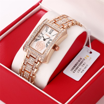 Montres dames en alliage de zinc avec aiguilles diamant échelle romaine