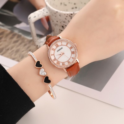 montre chiffres romains ceinture avec diamants