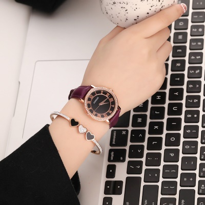 montre chiffres romains ceinture avec diamants