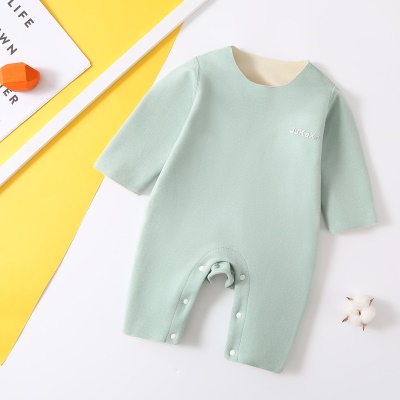 Combinaison pour bébé rayures en fibres chimiques et boutons mélangés