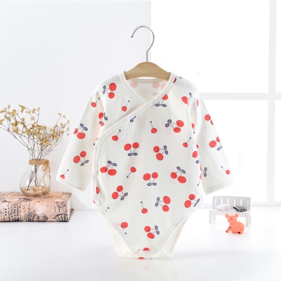 Combinaison bébé en coton double patte biseautée et boutonnage simple