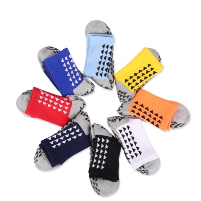 Chaussettes de football antidérapantes à tube moyen distribuées pour épaissir et absorber la transpiration