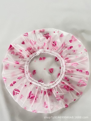 Bonnet de bain transparent à pois colorés