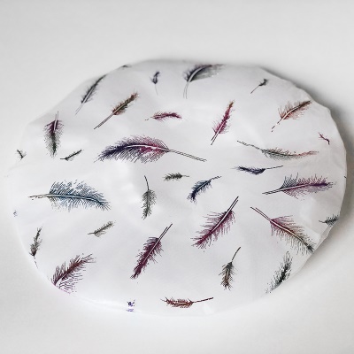 Bonnet de bain imprimé en plumes colorées