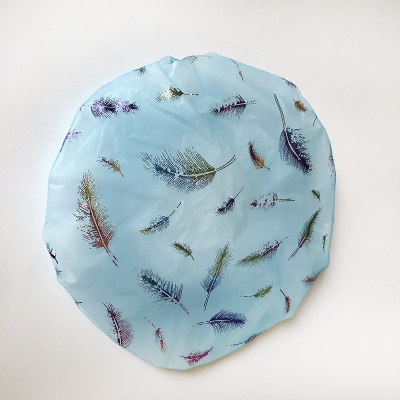 Bonnet de bain imprimé en plumes colorées